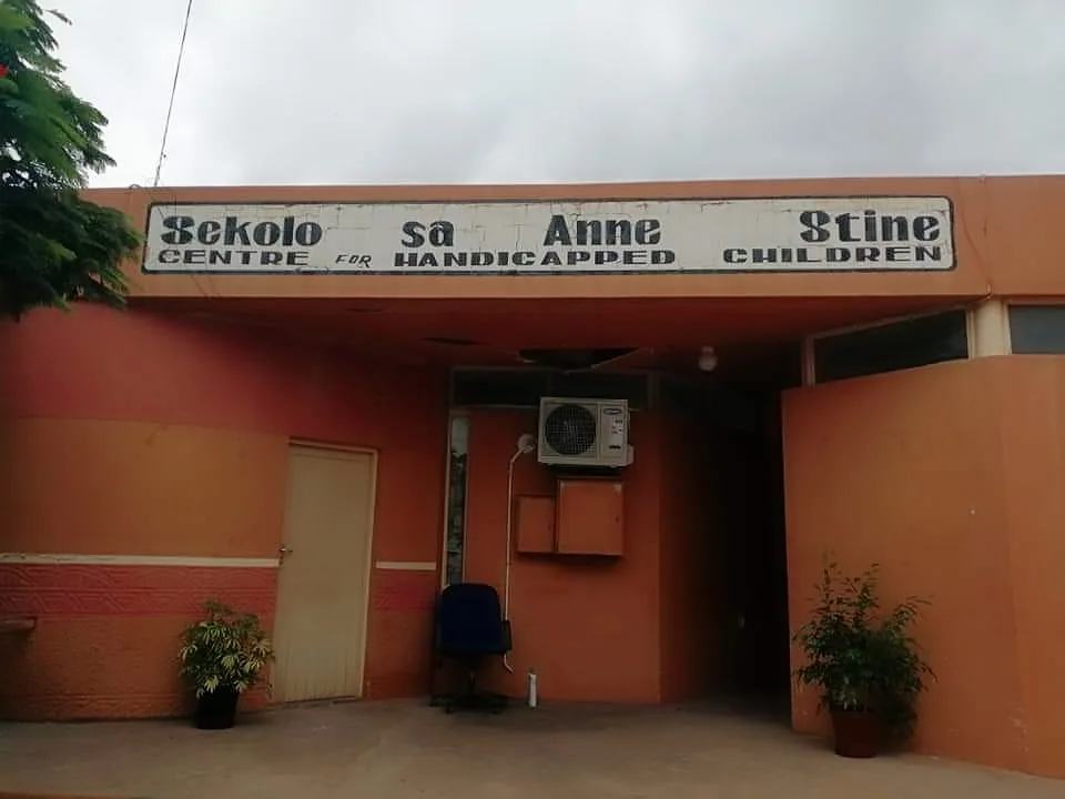 The entrance to Sekolo sa Anne-Stine in Molepolole, with the centre’s original sign above the doorway.